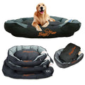 Golden Retriever lying in BingoPaw dog bed by the fireplace