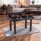 Raised dog feeder set including stainless steel bowls and non-slip mat, living room setting